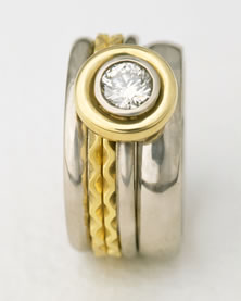 Five band 'Stacking Ring Single-stone' in Platinum and 18K yellow gold with 0.5ct. diamond
